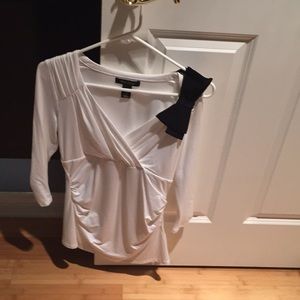 White blouse with black bow